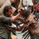 Illustration for article titled The Walking Dead Added Some Kind of Killer Performance Art Group or Something, I Don't Even Know